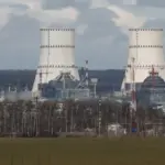 Російські військові на фоні Курської атомної електростанції (Фото: REUTERS/Shamil Zhumatov)